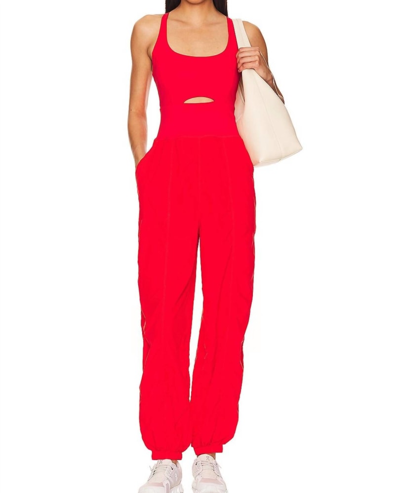 Front of a model wearing a size L Movement Righteous Onesie in Red in Red by Free People. | dia_product_style_image_id:363203